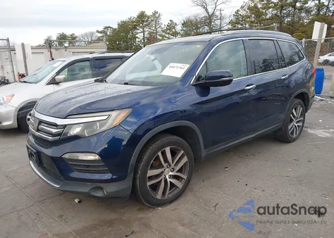 2016 Honda Pilot Touring z USA, uszkodzony, nr VIN 5FNYF6H91GB092058